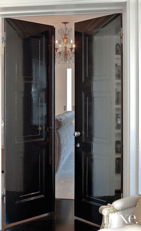 The open design of the shelving unit divides the space without blocking sunlight. Black Lacquered Doors - Transitional - bedroom - Luxe ...