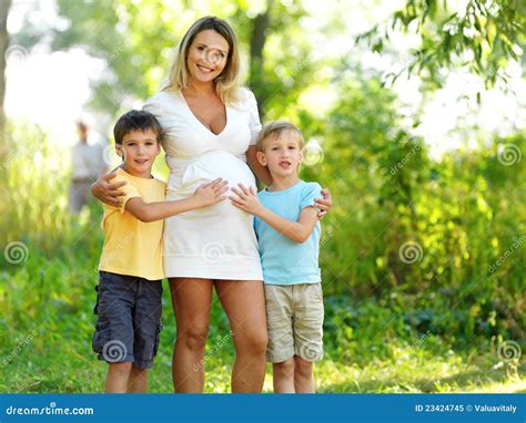 Pregnant Mother With Two Sons Royalty Free Stock Photo Image 23424745