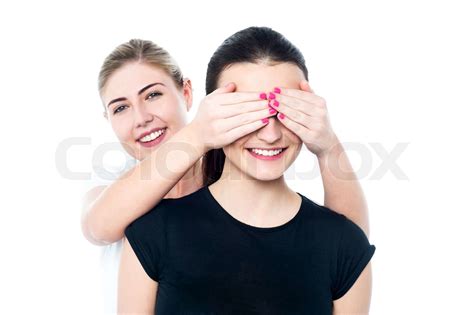 Girl In Playful Mood Teasing Her Friend Stock Image Colourbox