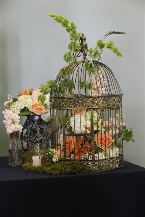 antebellum design and event company rustic fall decor bird cage decor green wedding flowers