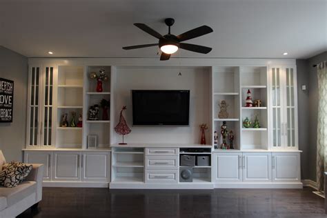 Hide your television when not in use by building this tv lift cabinet. Lounge Installations - BDS Interiors shopfitting
