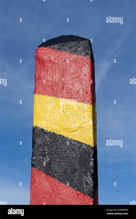 Boundary Post In National Colours Of Germany Stock Photo Alamy