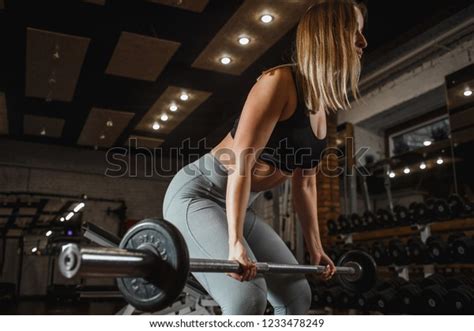 Young Woman Lifting Barbell With Light Weights At Gym Fitness Female Doing Crossfit Workout