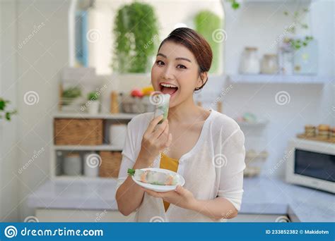 Woman Eating Healthy Spring Roll Stock Photo Image Of Gourmet