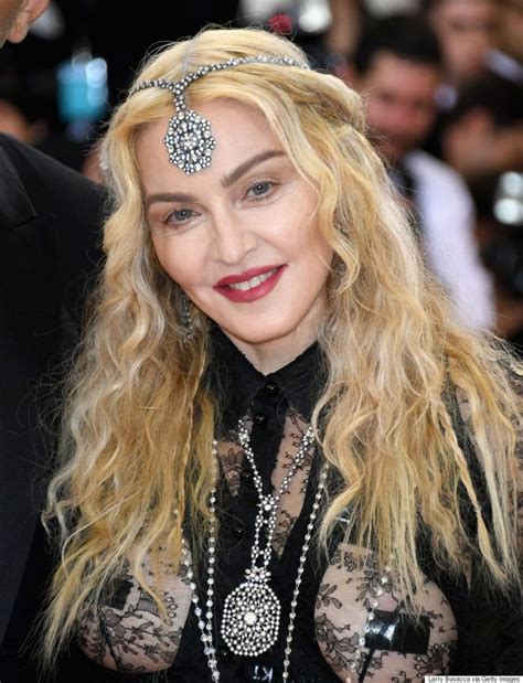 2016 Met Gala Madonna Lets It All Hang Loose In Revealing Givenchy Gown Huffpost Style