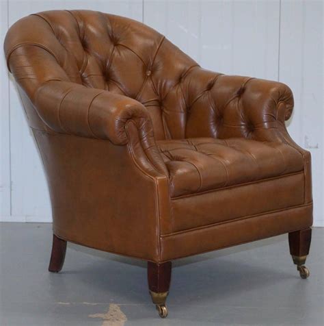 Aviator style brown leather chrome armchair. Vintage Chesterfield Aged Brown Leather Club Armchair ...