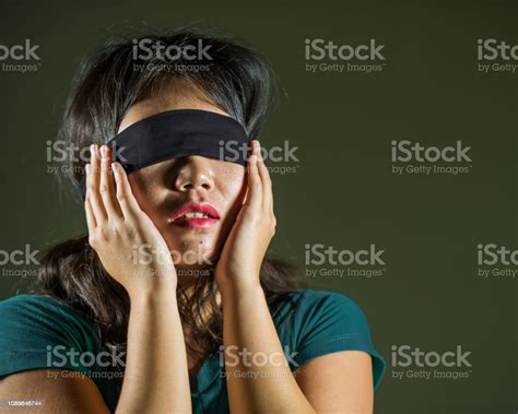 Young Scared And Blindfolded Asian Chinese Teenager Girl Lost And Confused Playing Dangerous