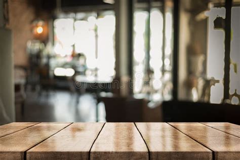 Empty Old Wood Table Top With Bokeh Coffee Shop Interior Background 3d