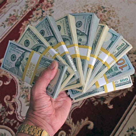 Maybe you would like to learn more about one of these? Money stacks in my hand! $100 dollar bills stacks - real inspirational power! Cash and watches ...