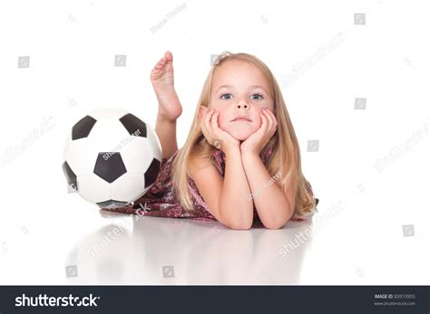 A Nice Image Of A Girl Laying Down With A Soccer Ball Bouncing By Her The Soccer Ball Has