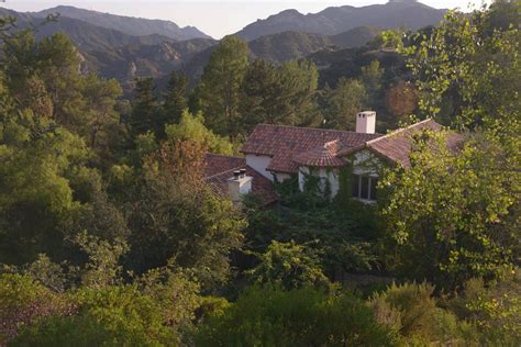 Looking at the house from the upper deck/floating bed in summer time