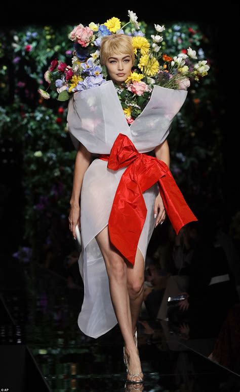 Gigi Hadid Rocks Bright Bouquet At Moschino Mfw Show Daily Mail Online