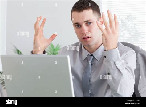Businessman Unhappy About His Laptop Stock Photo Alamy