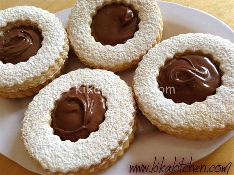 Scopri una ricetta semplice e originale per preparare occhi di bue: Occhi di bue alla nutella (biscotti con nutella) | Kikakitchen