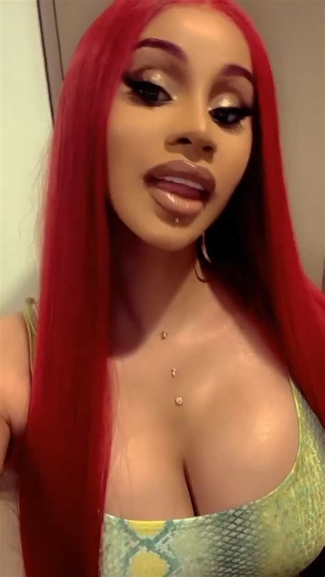 Cardi B Shows Off Her Cleavage And Legs At TAO Photos Video
