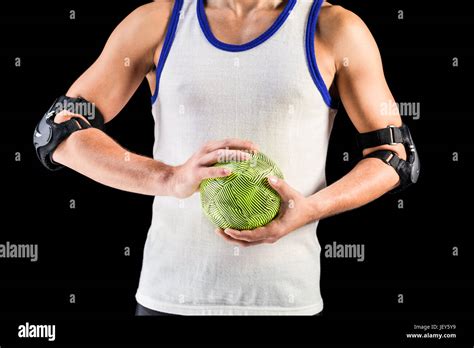 Mid Section Of Athlete Man Holding Ball Stock Photo Alamy