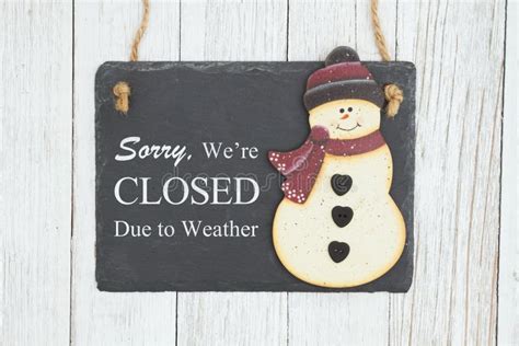Sorry We Re Closed Due To Weather Sign On A Hanging Chalkboard With