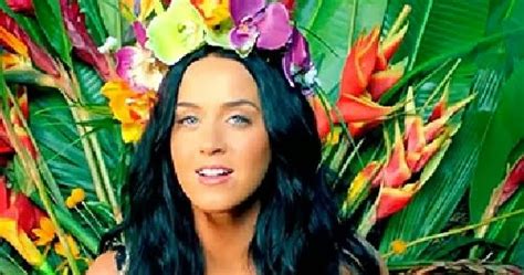 katy perry in a leopard bikini as the queen of the jungle for new single roar leopard curves