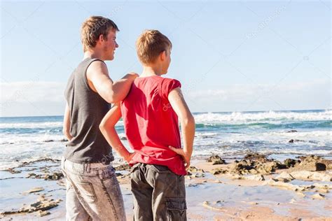 Teen Boys Beach Together — Stock Photo © Chrisvanlennepphoto 45570617