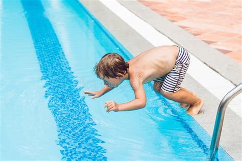 Happy Boy Kid Jumping In The Pool Stock Photo Image Of Pool People