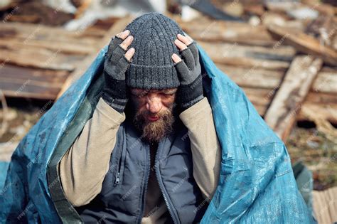 Premium Photo Sad And Upset Homeless And Unemployed Man In The Ruins