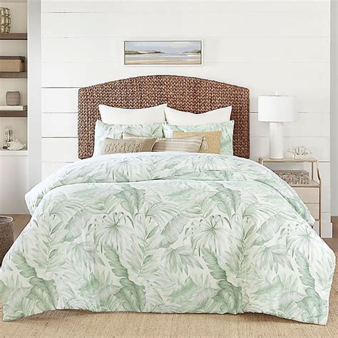The quilt sets include a quilt which is a light comforter and the set comes with an extra throw pillow cover. Coastal Living® Green Palm Reversible Comforter Set | Bed ...