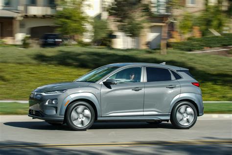 The compact utility vehicle features a spacious interior for its size that's equipped with reclining front seats with footrests. HYUNDAI Kona Electric specs & photos - 2018, 2019, 2020 ...