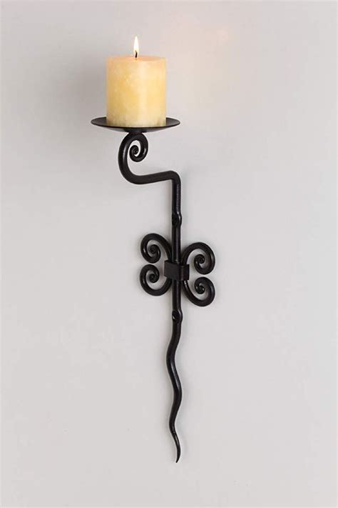 Shop our best selection of wrought iron candle holders, stands & candles to reflect your style and inspire your home. Wrought Iron Candle Holder, Wall Sconce Décor | Wrought ...