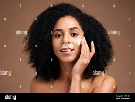 Face Cream And Black Woman In Studio For Skincare Beauty And