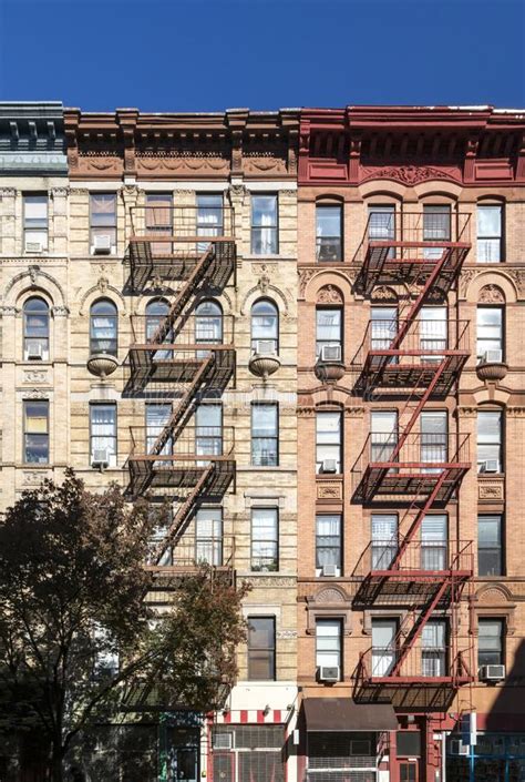 Colorful Old Apartment Buildings In New York City With Blue Sky
