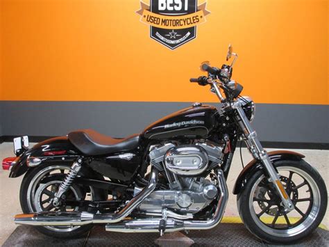 You enjoy a relaxed cruising position with the ability to lean forward and into the turns when you're feeling a little saucy. 2015 Harley-Davidson Sportster 883 | American Motorcycle ...
