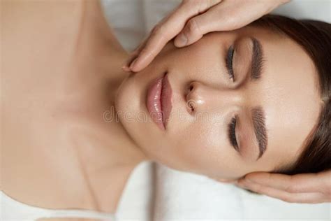 Face Massage Beautiful Of Young Woman Getting Spa Massage Treatment At Beauty Spa Salonspa