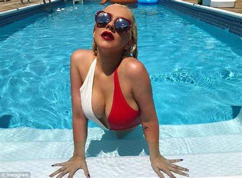 Christina Aguilera Strips To Her Bikini For Racy July Th Daily Mail