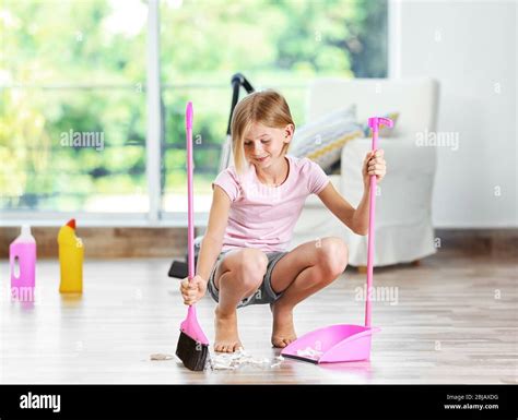 Girl Sweeping Hi Res Stock Photography And Images Alamy