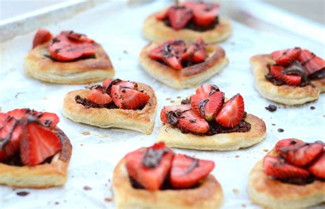 After, i top them with chocolate sauce. Nutella Strawberry Puff Pastry Hearts | A Life Well ...