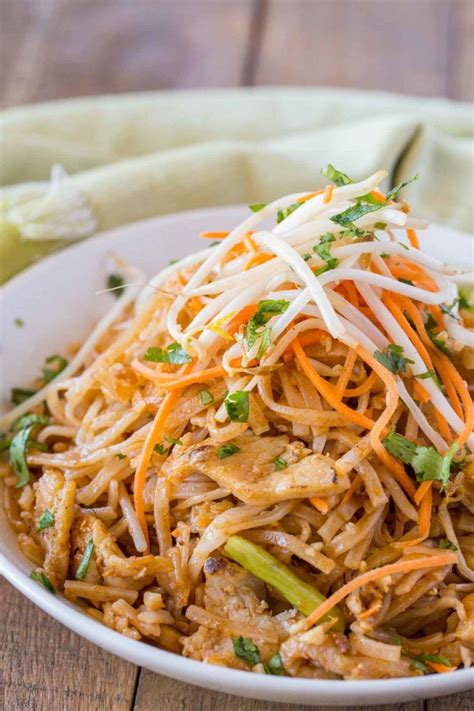 Drain rice noodles and add to the soup, along with the green onions, enoki mushrooms, and cilantro. Easy Chicken Pad Thai with rice noodles, Scallions and ...