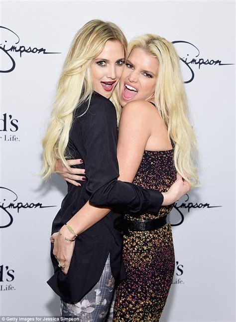 Jessica Simpson Gets A Little Cheeky With Sister Ashlee Grabbing Her On