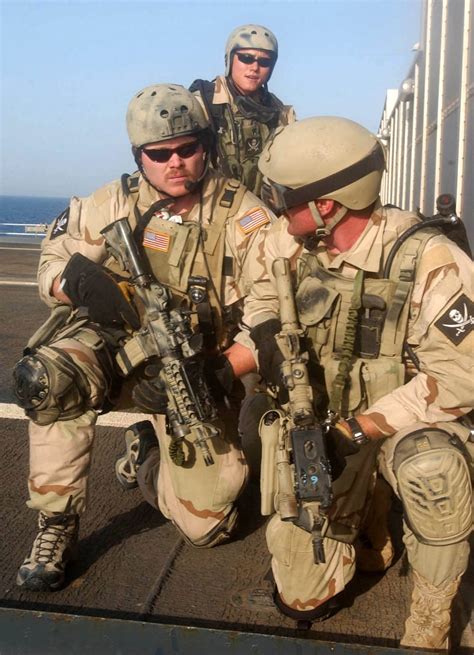 Us Navy Seals Pictured On The Deck Of A Ship During Vessel Boarding