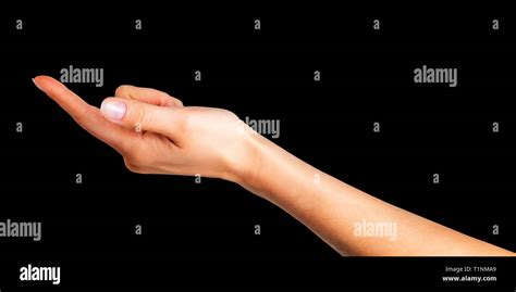 Woman Hand With The Index Finger Pointing Up Or Showing Direction Stock