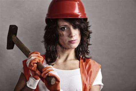 girl in safety helmet holding hammer tool stock image image of sensual attractive 103683011