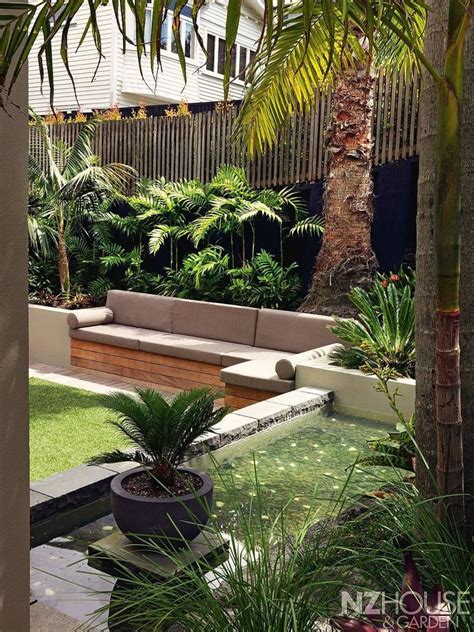 30 Fresh And Calming Tropical Garden Ideas Sloped Backyard