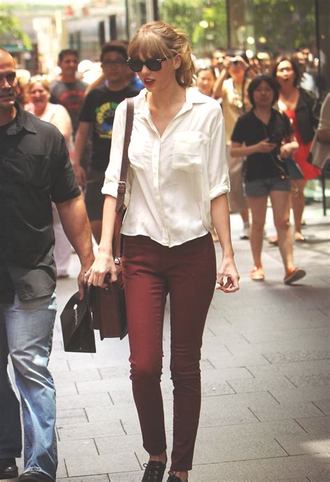 Taylor Swift Skinny Bordeaux Pants White Shirt Ray Ban Sunglasses