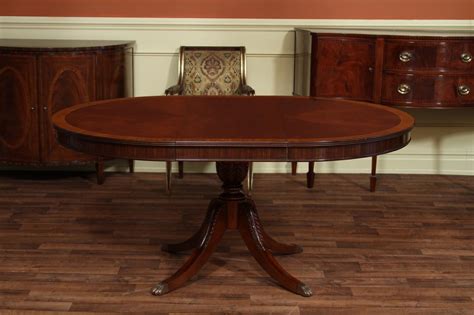 48 Round To 66 Oval Mahogany Dining Table Reproduction