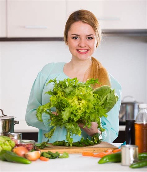Smiling Housewife Cutting Vegetables For Salad In Kitchen Stock Image Image Of Cookery