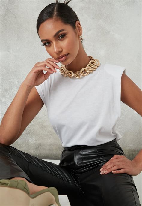 The ruggable 8×10 costs $399; White Shoulder Pad Sleeveless T Shirt | Missguided