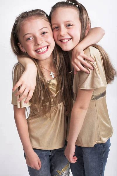 Two Little Girls Hugging Each Other Stock Photo By ©kanareva 162476624