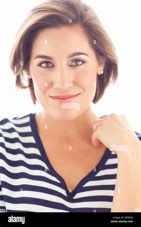 Head And Shoulders Portrait Of Young Woman In Studio Stock Photo Alamy