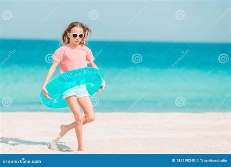 Cute Little Girl At Beach During Caribbean Vacation Stock Photo Image