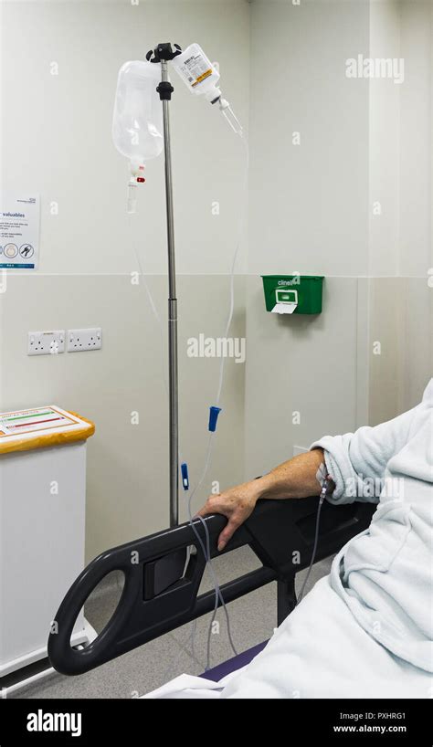 Hospital Ptient With Saline And Paracetamol Drips Stock Photo Alamy