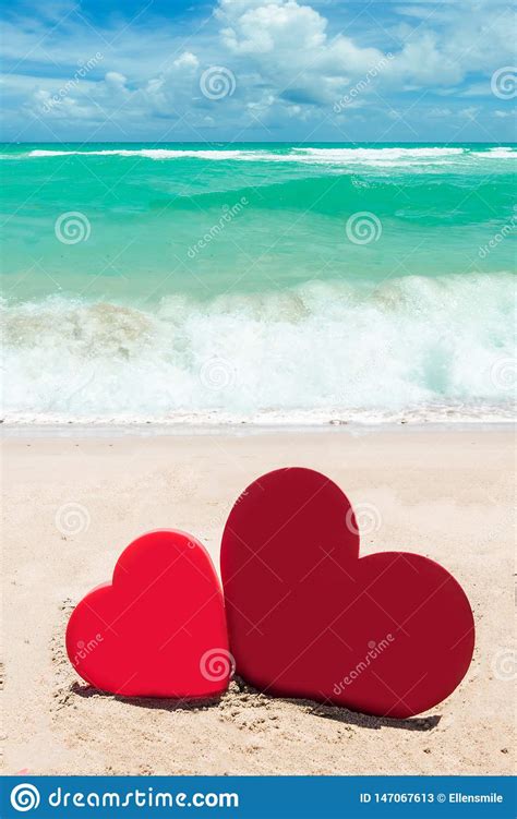 Two Hearts On The Sandy Beach Background Stock Image Image Of Heart